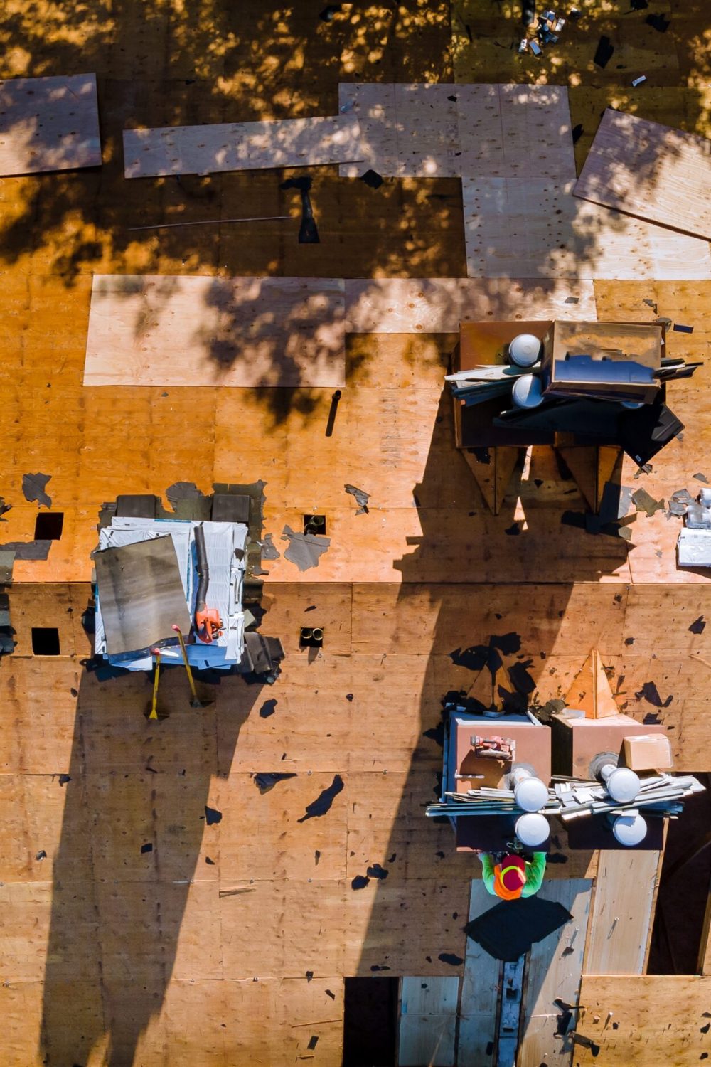 construction-worker-on-a-renovation-roof-the-house-2023-11-27-04-50-54-utc-1-scaled.jpg